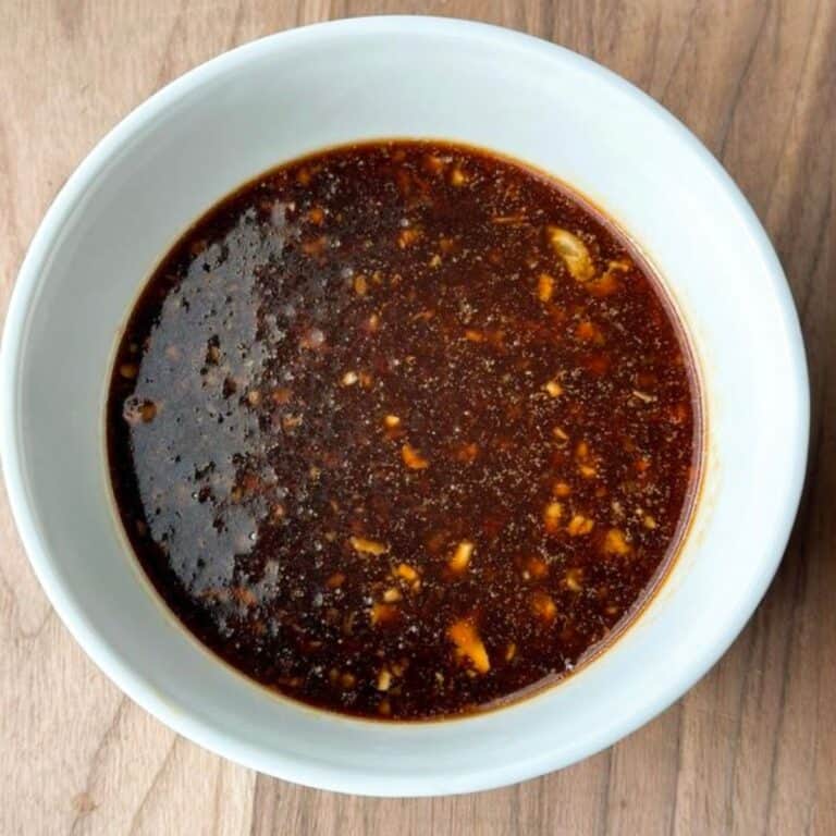 White bowl full of honey soy marinade