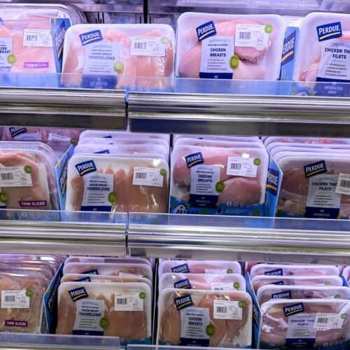 Different cuts of chicken breast on a supermarket shelf