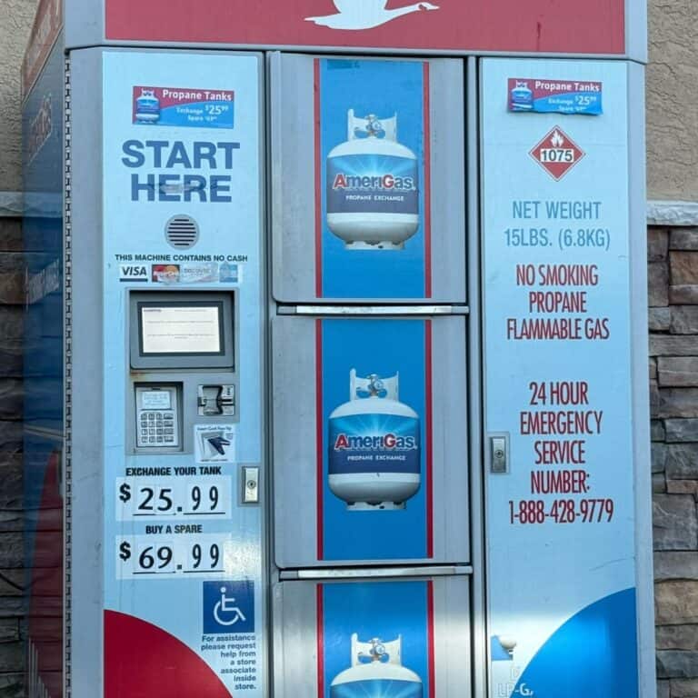 An automated propane exchange station showing a price of $25.99