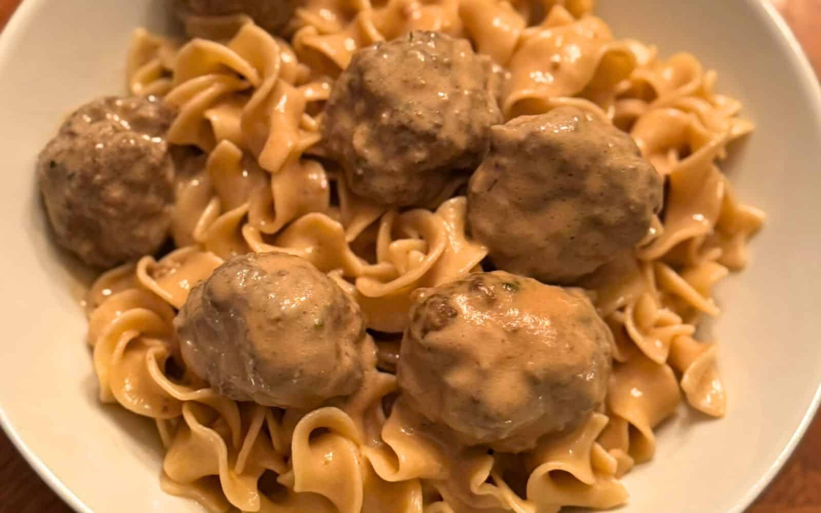 Swedish meatballs over egg noodles