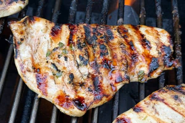 Tequila lime chicken cooking on the grill
