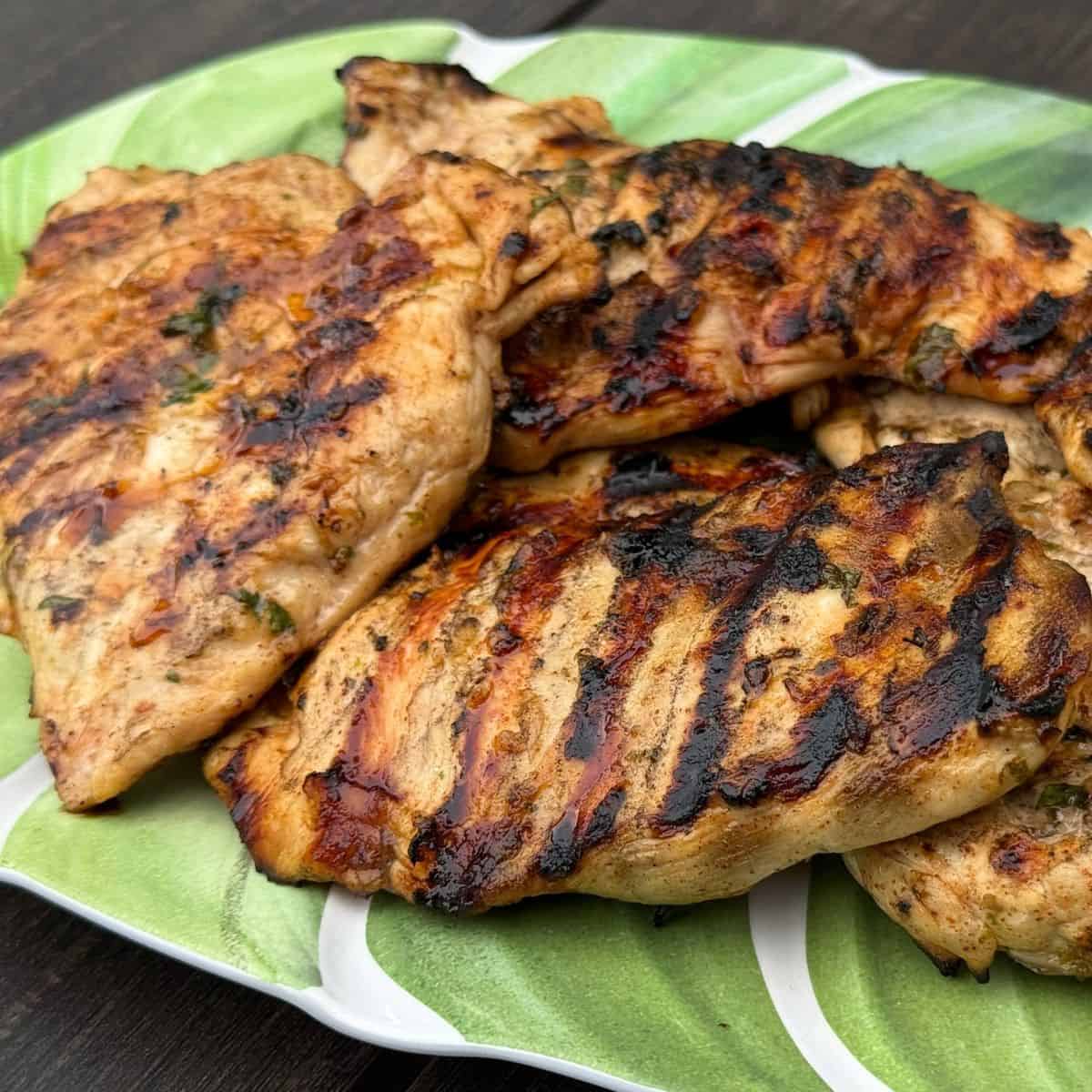 Platter full of grilled tequila lime chicken breast