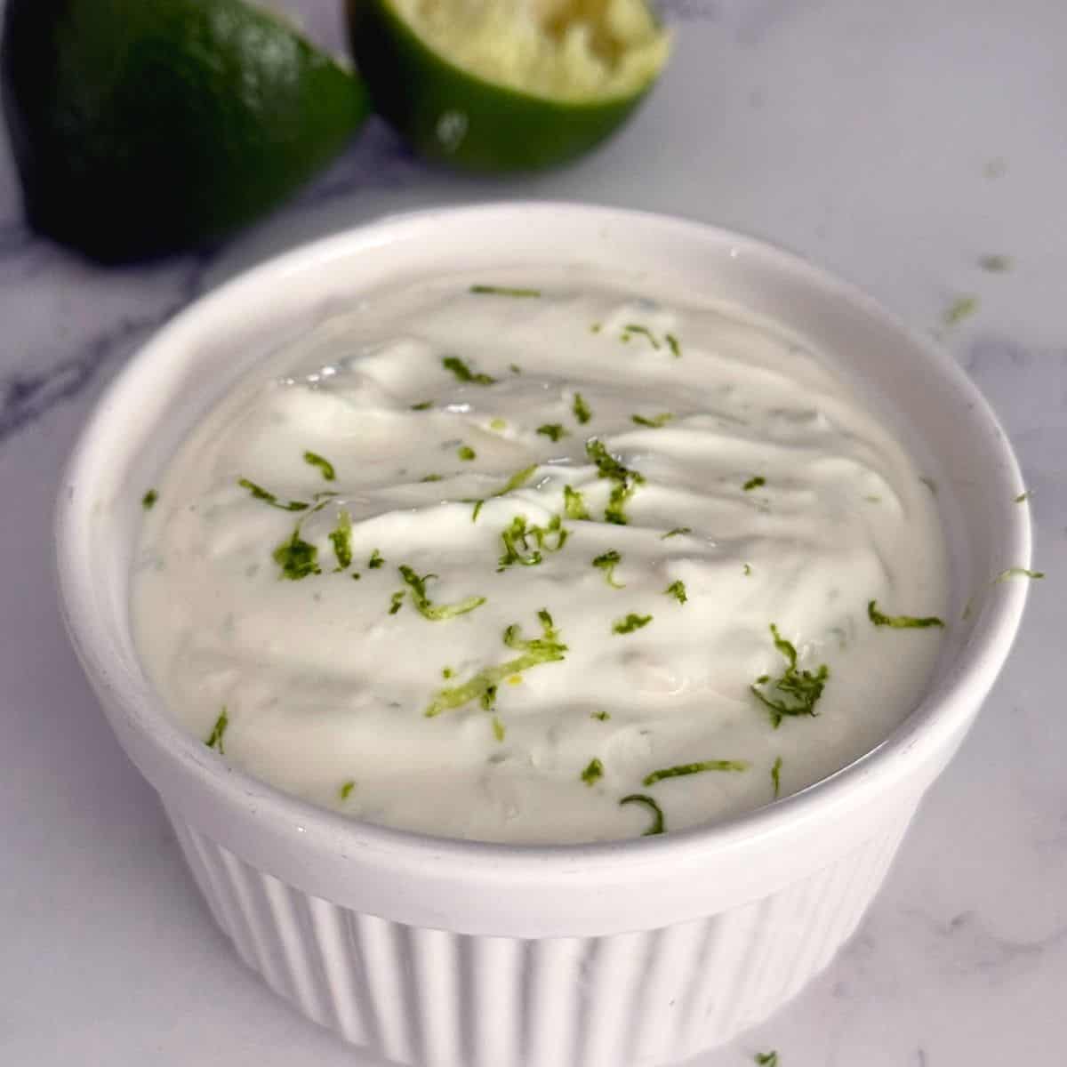 A bowl of fresh garlic lime crema