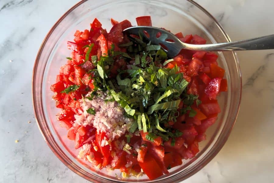 Glass bowl full of homemade no cook tomato sauce
